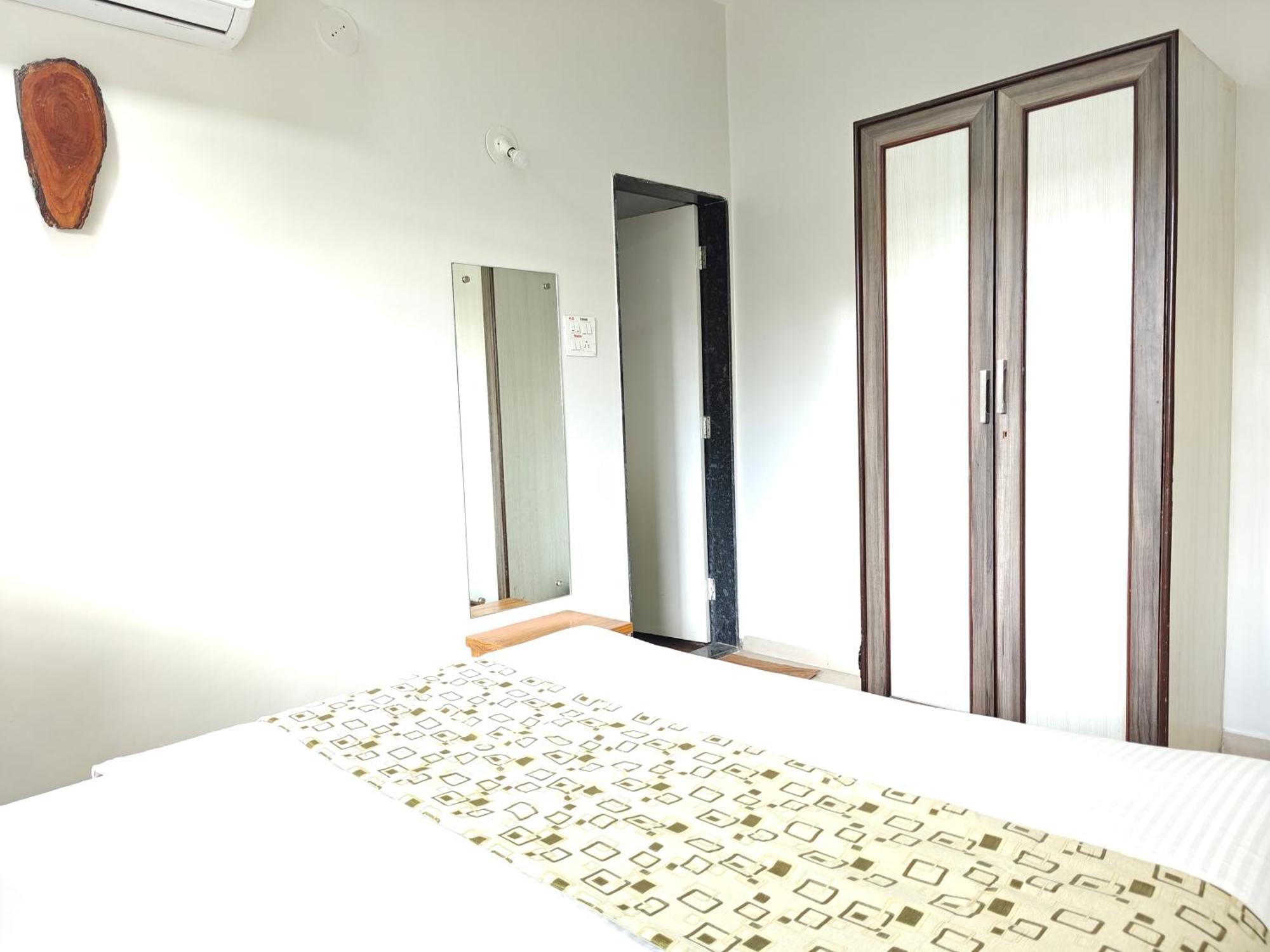 Chandralok Service Apartments Kolhapur Værelse billede